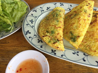 Rice pancakes, which began as street food, are now a food specialty in Hue, Vietnam. Photo courtesy of Kitty Morse.
