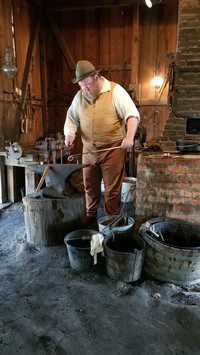  A blacksmith demonstrates his trade at Vermilionville Historic Village, a living-history museum and park in Lafayette, Louisiana. Photo courtesy of Jim Farber. 