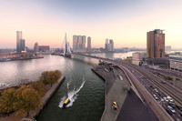 The skyline of Rotterdam, Netherlands, includes the Erasmus Bridge, nicknamed "The Swan" because of its elongated pylon. Photo courtesy of Claire Droppert.