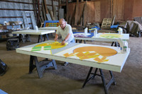  An artist at the Simpson Century Farm in Oregon's Tualatin Valley creates a quilt block that will adorn a nearby barn. Photo courtesy of Fyllis Hockman. 