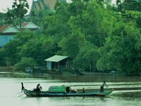  A traditional boat plies the waters of the Mekong River in Southeast Asia. Photo courtesy of Steve Bergsman. 
