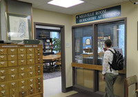  A visitor stops by the Melville Room at the Pittsfield, Massachusetts, Athenaeum. Photo courtesy of Steve Bergsman. 