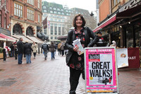 Guide Karen waits near Leicester Square in London for participants to arrive for the "Theatreland Walk." Photo courtesy of Adam Scott.