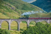 A Jacobite steam train crosses the Glenfinnan Viaduct in Scotland, just as the Hogwarts Express does in the Harry Potter movies. Photo courtesy of David Gonzalez Bebolio/Dreamstime.com