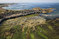  Barfleur, one of the most beautiful villages in France, is a port on the Cotentin Peninsula which juts into the English Channel on the northeastern coast of La Manche County in Normandy. At low tide boats are stranded on their keels. Photo courtesy of Jerome Houyvet. 