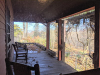 The wraparound porch at the T.C. Steele State Historic Site in Brown County, Indiana, is one of the places where the artist could take inspiration for his Impressionist paintings. Photo courtesy of Athena Lucero.