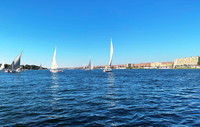  Traditional wooden sailboats called "feluccas" provide a peaceful way to ply the waters of the Nile River in Aswan, Egypt. Photo courtesy of Phil Allen. 