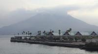  The Sakurajima Volcano in Kagoshima, Japan, is a stratovolcano built up by lava and ash, just like Vesuvius. Photo courtesy of Philip Courter. 