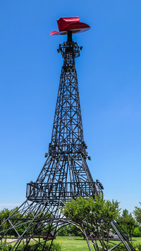  An Eiffel Tower with a cowboy hot on top of it welcomes visitors to Paris, Texas. Photo courtesy of Jai Mo/Dreamstime.com. 