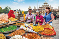 Members of an Overseas Adventure Travel tour group visit a spice market in India. Photo courtesy of Grand Circle Corp.