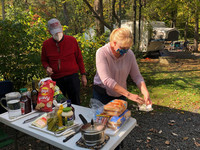  A family enjoys a masked picnic at an RV park. Photo courtesy of Bill Neely. 