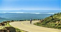 A cyclist pedals down Cadillac Mountain in Maine's Acadia National Park. Photo courtesy of Jinnee/Dreamstime.com. 