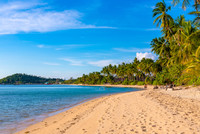  A photo of just a few people on an almost-deserted beach could be misleading. Photo courtesy of Aleksandr/Dreamstime.com. 