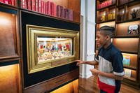 Visitors to the Planet Word Museum in Washington, D.C., experiment in the Painting With Adjectives exhibit. Photo courtesy of DuHon Photography.