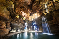  At Big Cedar Lodge in Ridgedale, Missouri, guests have access to carts they can drive through Lost Canyon Cave, a four-story-high cavern that houses a cascading waterfall. Photo courtesy of Big Cedar Lodge. 