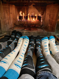 Skiers enjoy a cozy evening by the fire after a day on the slopes at Mammoth Mountain, California. Photo courtesy of Margot Black.