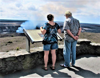  Visitors to Hawaii Volcanoes National Park take in the view. Photo courtesy of Victor Block. 
