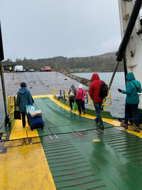  Passengers disembark the ferry on the Isle of Eigg in Scotland. Photo courtesy of Sharon Whitley Larsen. 