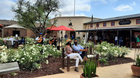  Visitors pause to listen to mariachi music outside Bolero at Europa Village in Temecula, California. Photo courtesy of Jim Farber. 