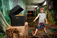 A child plays MagiQuest at the Great Wolf Lodge in Williamsburg, Virginia. Photo courtesy of Great Wolf Lodge.