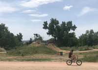  An intrepid biker leaps into the sky at the Valmont Bike Park in Boulder, Colorado.</p>
<p>Photo courtesy of Lesley Sauls Frederikson. 