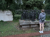 A student pauses at a memorial to deported Jews in Berlin, Germany. Photo courtesy of Lesley Sauls Frederikson.