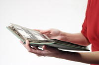  Once photographs are organized they can be made into gifts such as photo albums. Photo courtesy of Yiriy Chaben/Dreamstime.com. 
