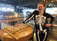  Hannah Legacy serves up a flight of beer at Mike Hess Brewing in North Park, San Diego, California. Photo courtesy of Jim Farber. 