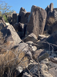  The hike is rough, but finding ancient writings at the Three Rivers Petroglyph Site in Tularosa, New Mexico, is worth the effort. Photo courtesy of Bill Neely. 