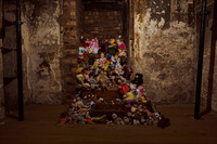 Visitors to the Real Mary Kings Close in Edinburgh, Scotland, leave toys to honor a child who lost her family to the bubonic plague. Photo courtesy of the Real Mary King's Close.