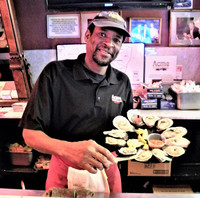  Michael Broadway is the master oyster shucker and resident showman at the Acme Oyster Bar in New Orleans, Louisiana. Photo courtesy of Victor Block. 