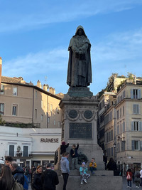  A statue of Giordano Bruno silently watches over bustling crowds in Rome's Campo de'Fiori. Photo courtesy of Lesley Frederikson. 
