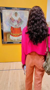 A woman views one of Diego Rivera's paintings now on display at the San Francisco Museum of Modern Art. Photo courtesy of Jim Farber. 
