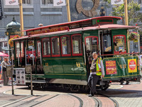 Crew members reverse direction of a cable car at the Market Street turnaround in San Francisco, which operates the country's last hand-operated cable car system. Photo courtesy of Athena Lucero.