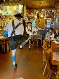  Young men perform traditional schuhplattler folk dances in Ludwigstrasse in the Gasthof Fraundorfer in Garmisch-Partenkirchen, Germany. Photo courtesy of Margot Black. 