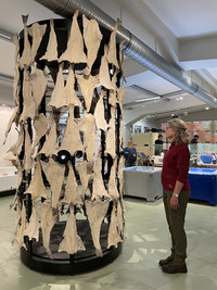 A visitor at Reykjavik's Maritime Museum stands by a display of salted fish like those her grandparents once enjoyed. Photo courtesy of Lesley Frederikson.