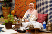  A woman serves mint tea to guests at her home in Fes, Morocco. Photo courtesy of Phil Allen. 