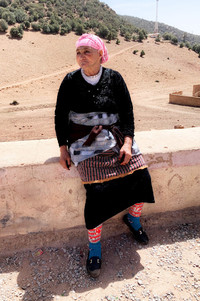  A Berber woman in Morocco visits with travelers who stop at her nomadic village. Photo courtesy of Phil Allen. 