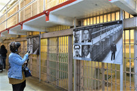  A visitor learns what it was like to be a prisoner at Alcatraz in San Francisco, California. Photo courtesy of Bennn/Dreamstime.com. 