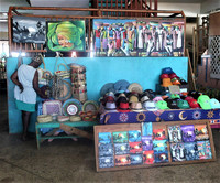  A shopper examines merchandise at the Castries Market in St. Lucia. Photo courtesy of Victor Block. 