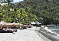  A beach on Marigot Bay in St. Lucia offers a welcome respite to travelers. Photo courtesy of Shutterstock. 