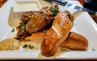 Hops Downtown Grill in Kalispell, Montana, is the place to go for Elk Bratwurst and Ale House Pretzel. Photo courtesy of Jim Farber.