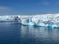  Vibrant white and blue tabular icebergs that float in the Prince Gustav Channel in Antarctica can be miles long but are quickly melting. Photo courtesy of Lesley Frederikson. 