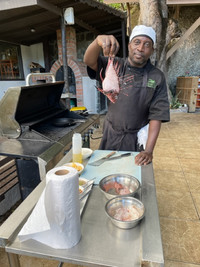 The Green Fig's Chef Wesley teaches a safe and tasty way to dispose of lionfish, an invasive species in the Caribbean. Photo courtesy of Lesley Frederikson. 