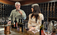  Mark LaPierre and his daughter, Marnie, sample wines at their new LaPierre Farms and Winery in Zillah, Washington. Photo courtesy of Jim Farber. 