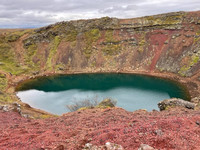 . Rich rust and turquoise colors in Kerid Crater come from volcanic minerals in the soil there. Photo courtesy of Lesley Frederikson. 