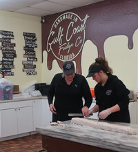  Fudge-makers at the Gulf Coast Fudge Co. create tasty treats for visitors to the World's Largest Shell Store in Bonita, Florida. Photo courtesy of Victor Block. 