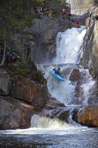 A kayaker plunges down Smalls Falls in Franklin Township, Maine. Photo courtesy of Stephanie Chu-O'Neil.