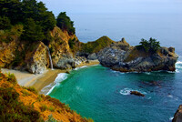 McWay Falls in the Julia Pfeiffer Burns State Park in California, spills over copper-colored cliffs onto a Pacific Ocean beach. Photo courtesy of Photoquest/Dreamstime.com.