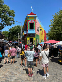 Colorful buildings and cobblestone streets are the hallmark of La Boca in Buenos Aires, Argentina. Photo courtesy of Lesley Frederikson.